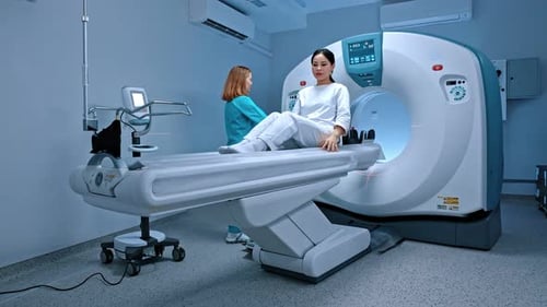 Professional Radiologist and Patient in Computed Tomography Room In Modern Hospital Qualified Doctor