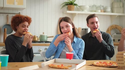 Home Party Overjoyed Diverse Friends Eating Ordered Pizza for Home Party Happy Group Mixed Race