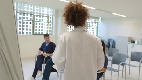 Medical Professionals Participating in Hospital Training Meeting