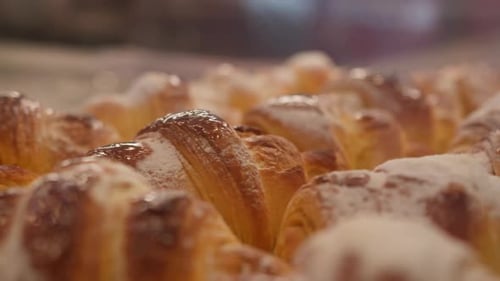 Freshly Baked Croissants Bring Warmth to a Sunny Bakery in the Morning