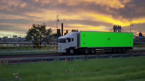 White Semi Truck Driving on Highway at Sunset with Green Screen Mockup