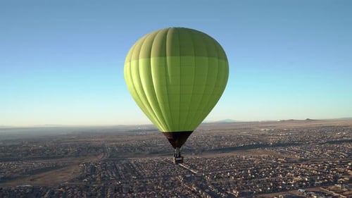 Hot air balloon peacefully floats above Albuquerque New Mexico, 4K