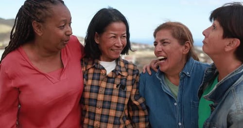 Smiling Women Friends Standing Together Outdoors