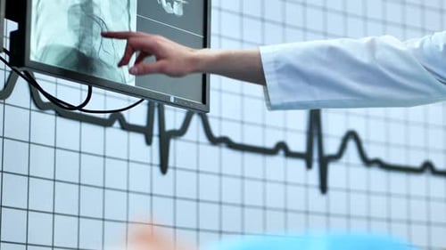 Doctor Discussing Heart Xray with EKG Wave Analyzing Medical Data and Diagnosis