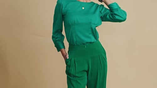 Asian Model in Elegant Outfit Posing in Photo Studio