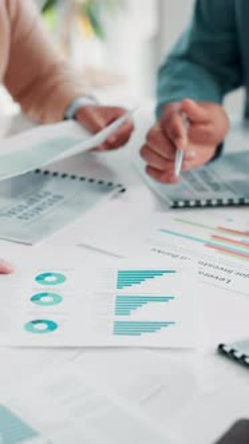 Hands, documents and charts for meeting at office with review, team and investment planning