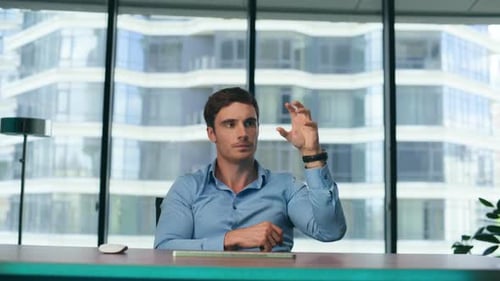 Manager Working Holographic Projection in Modern Futuristic Office Close Up