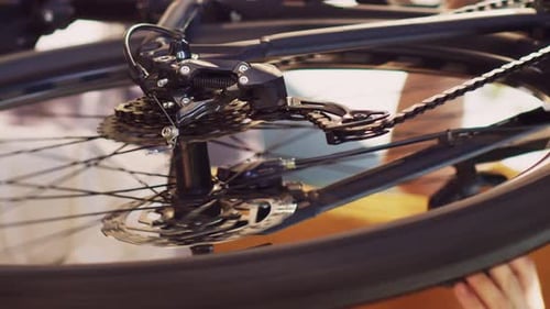 Close Up of Spinning Bicycle Wheel and Cassette