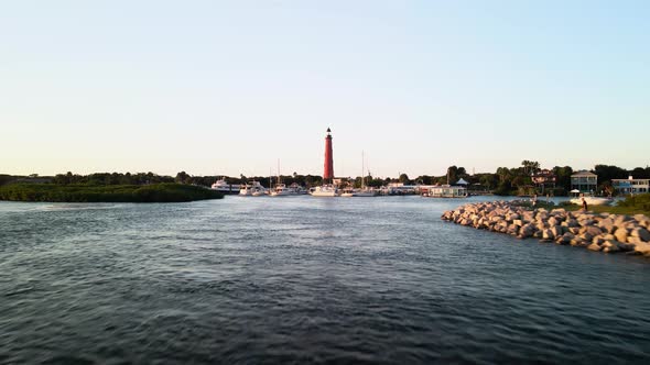 Drone shot of Ponce Inlet Lighthouse in Florida at sunset, Buildings ...
