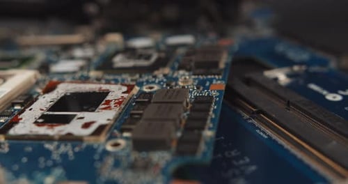 Extreme Close up Of Main Printed Circuit Board Of Computer On Table.