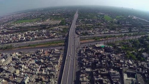 Aerial view over the City traffic road junction and canal, bridge highway