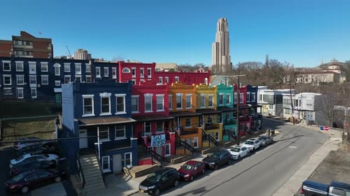 Oakland University of Pittsburgh houses. Aerial shot of colorful houses with Pitt Cathedral of Learn