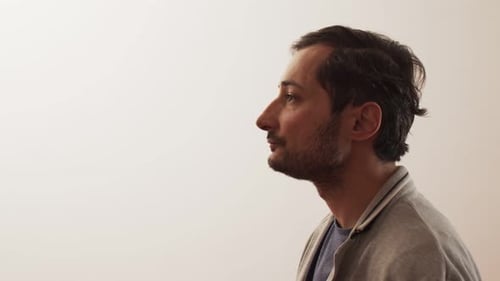 Man Drinking Water in a Close Up Shot