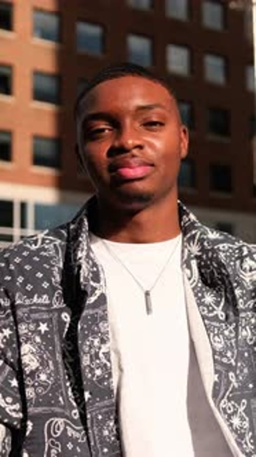 African American Man Giving Thumbs Up in a Modern City Environment Vertical Video