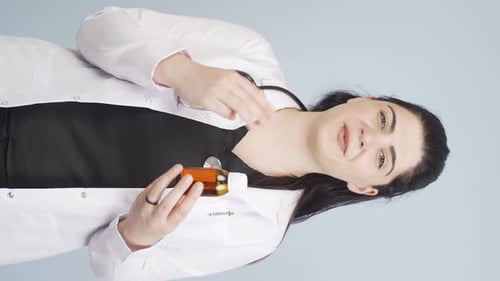 Smiling Doctor Explains Medicine in Vertical Video