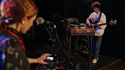 Live Band Performing in Dimly Lit Venue