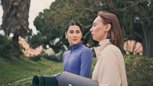 Sportswomen Park Conversation Closeup. Peaceful Laughing Women Walking Together To Fitness Workou...