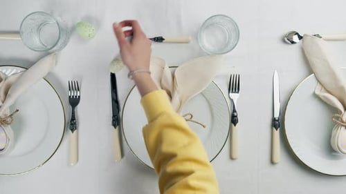 Placing Easter Eggs on Beautifully Set Table