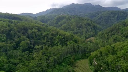 Aerial view of the mountains with beautiful green hills in Rembang, Central Java, Indonesia.