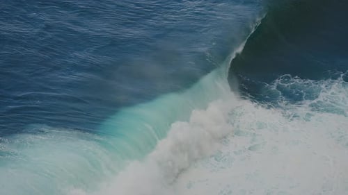 Large ocean wave breaking in super slow motion. Force, power and energy of nature concept.