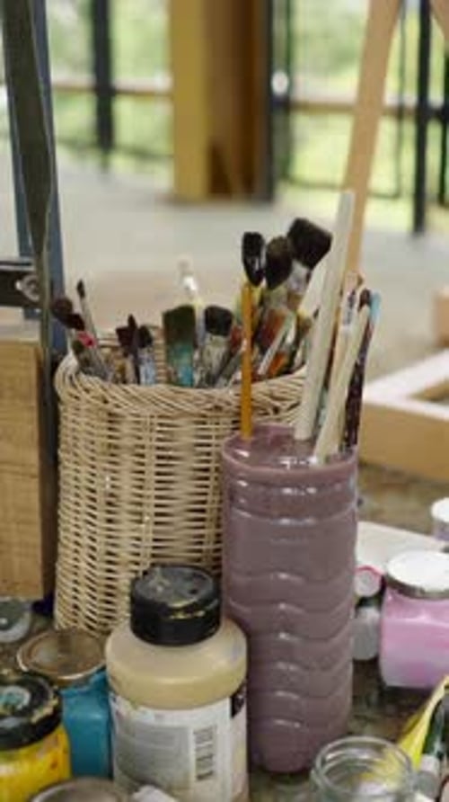 Artist's Workstation with Brushes and Paint