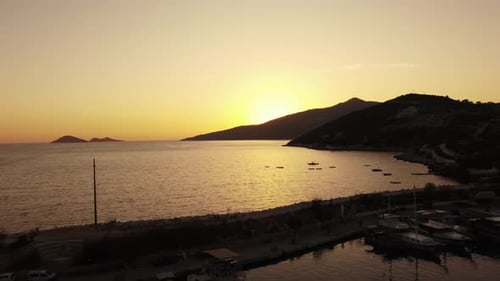 Aerial View of Bali Beach Island and Sliver of Sand on Sunset Beach in the Evening Sunset Sea View