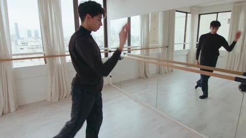 Young Adult Ballet Practice in an Urban Studio