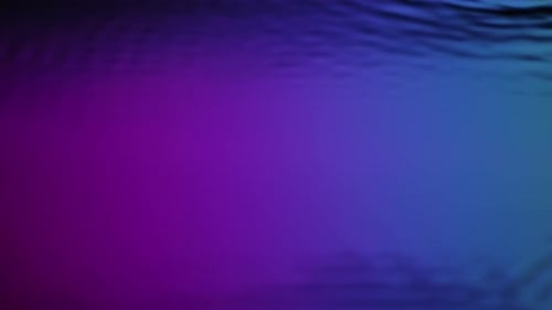 Water Surface Colored By Low Light Creating Waves Circles Under Ultra Sound Vibrations Abstract