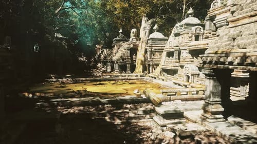 Serene Ancient Temple Structures Surrounded By Vibrant Greenery and Water