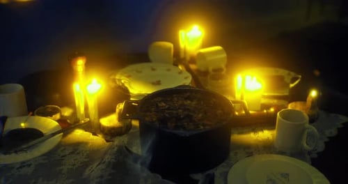 Warm Candlelit Dinner Table Setting for Festive Gatherings