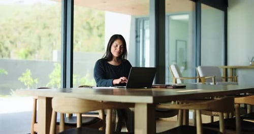 Business, woman and document with laptop in office for proofreading article and update draft