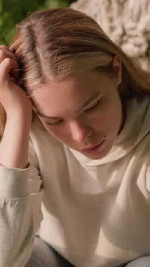 Young Woman Portrait Outdoors in Natural Light
