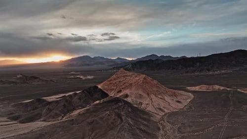 Majestic Desert Mountains at Sunrise Aerial View