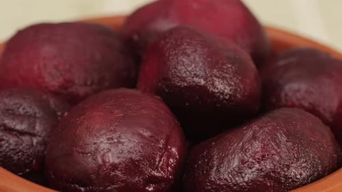 Raw Peeled Vegetable Beet in Plate on Wooden Table Closeup Preparing Raw Vagetables Food for Cooking