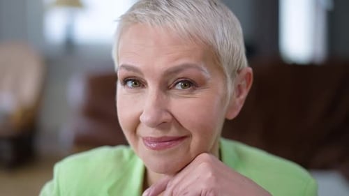 Smiling Woman Looking at Camera Close Up
