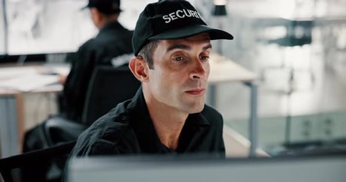 Serious man, security and control room with surveillance for safety monitoring in secure building