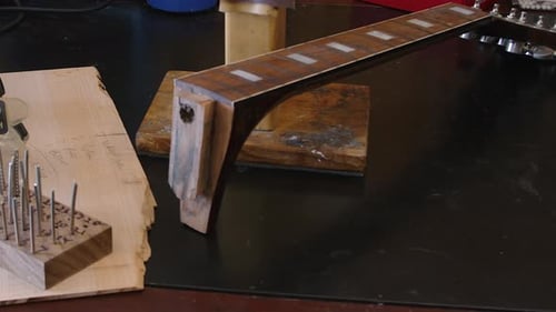 Guitar Neck Under Construction on a Workbench