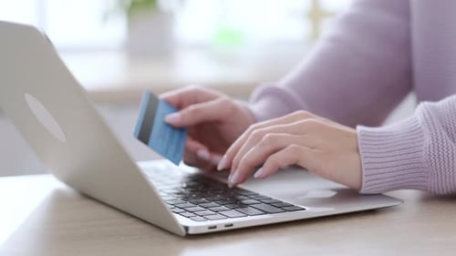 Woman Shopping Online, Typing on Laptop with Credit Card