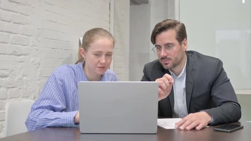 Young Business People Working Together in Office