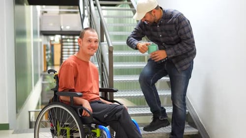 Friends Talking in Modern Workplace Setting