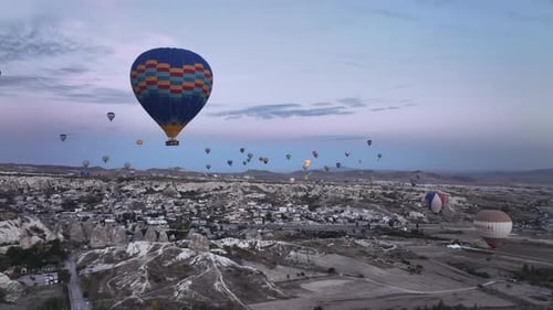Balloons Over Cappadocia, Turkey at Sunrise