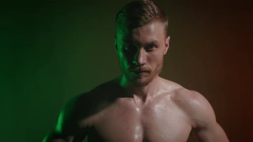 Portrait of a Young Sportsman with a Bare Body