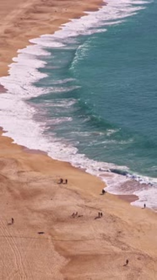 Sandy Beach and Blue Sea People on the Beach