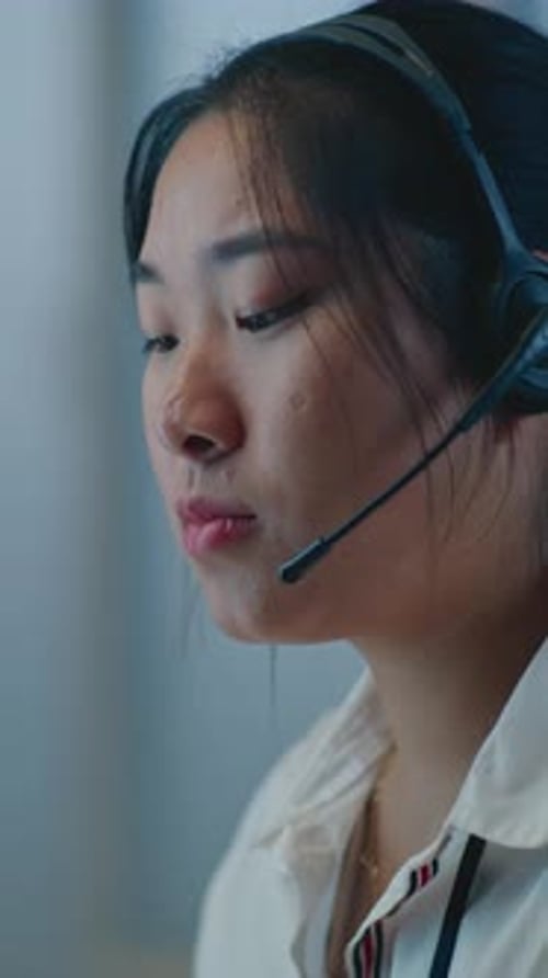 Woman at Work Wearing Headset