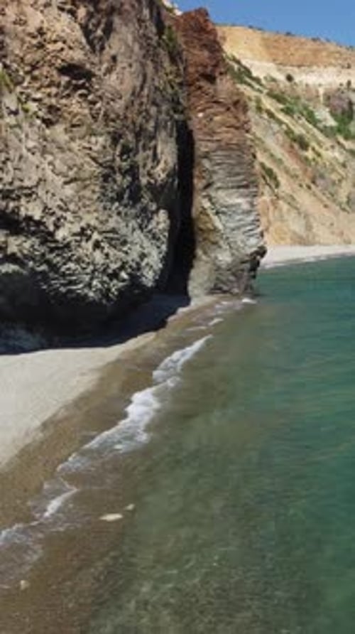 Aerial Vertical View of Seascape with Crystal Clear Azure Sea and Rocky Shores A Beautiful Lagoon on