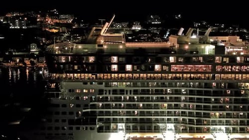 Large Cruise Ship Moving at Night