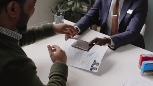 Business Partners Shake Hands After a Deal