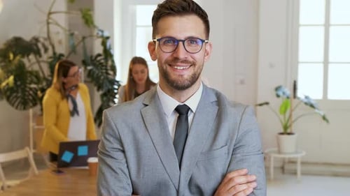 Portrait of confident businessman in office.