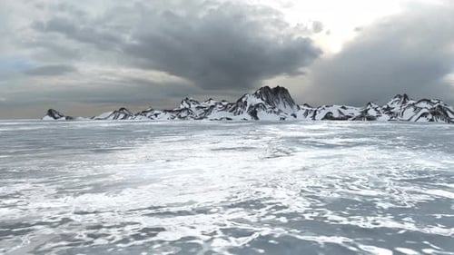 Snowy mountains with frozen sea ice, North Pole