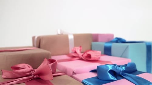 Wrapped Birthday Gifts with Satin Ribbons and Bows